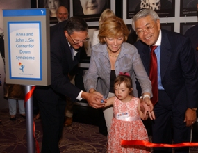 Anna and John J. Sie with granddaughter Sophia and Children's Hospital's Jim Shmerling at opening of Sie Center for Down Syndrome