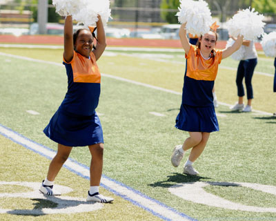 Global Down Syndrome Foundation Kicks Off 2013 Denver Broncos Cheerleaders Dare to Cheer, Dare to Play Football Camps